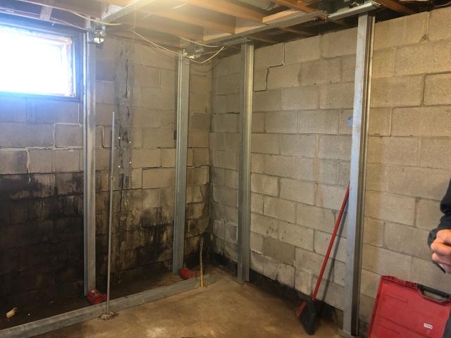 PowerBrace™ Beams Installed Along Perimeter of Basement