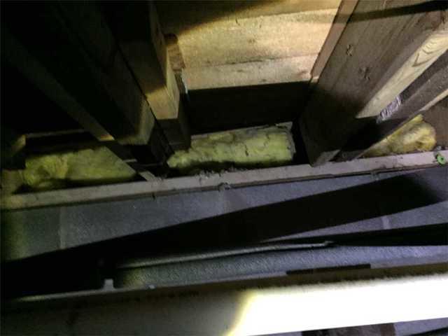 Before Photo Of Failing Rim Joist Insulation