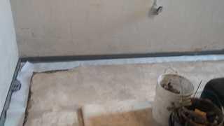 To install this in-ground drainage system, we remove a portion of the basement floor around the perimeter to collect any water and direct it to the sump pump.