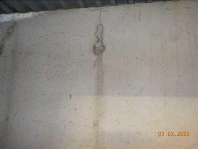 Water Damage Around the Crack in the Wall