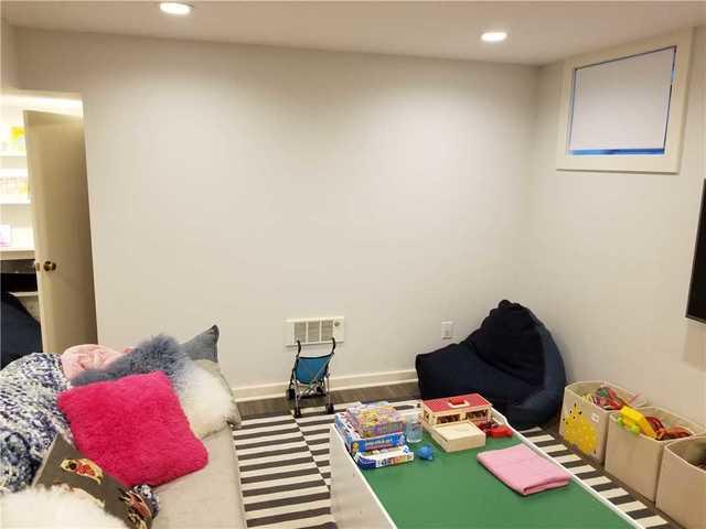 This finished basement was used as a play area but once water started seeping in through the walls and floor, it became musty and unhealthy.