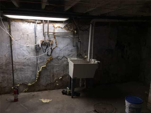 This basement has cracked and bowing walls.