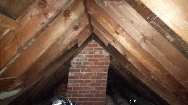 Another area for air leakage was the masonry chimney. Rockwool is an ideal solution here since the chimney should not be touching combustible materials such as wood, fiberglass or foam. Rockwool is a non-combustible fireproof mineral fiber that can withstand temperatures of up to 2000 degrees Fahrenheit.