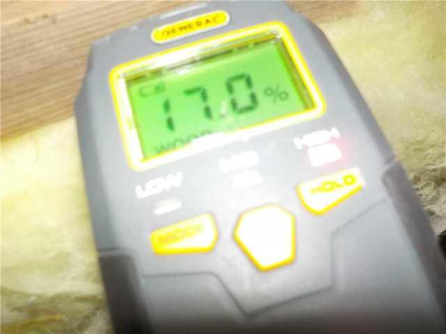 Pin Point Moisture Reader Shows High Moisture