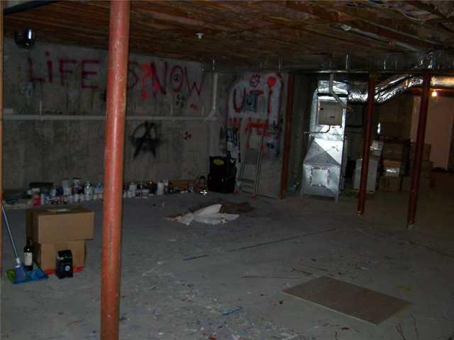 The original look of the basement before any of our crew members began production on the basement. After seeing the transformation, you will not believe this is what this basement used to look like.