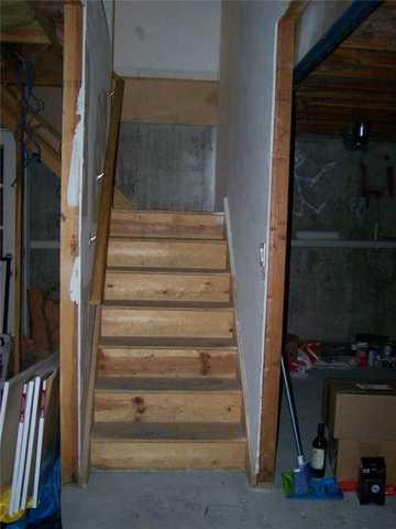 These were the original stairs that led from the ground floor into the basement. Clearly, the walls around them as well as the stairs themselves were in need of a renovation.