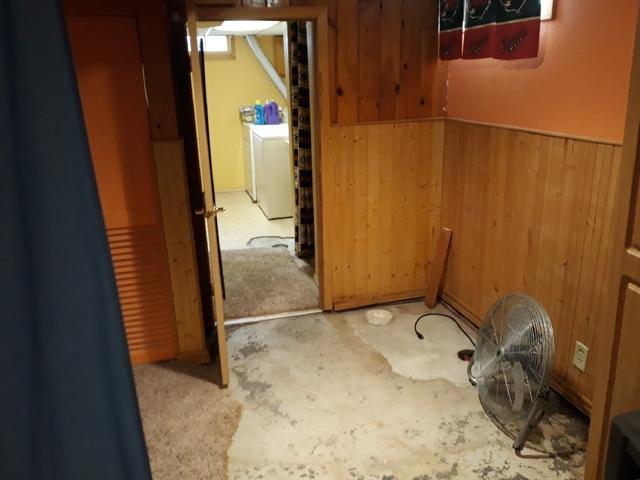 This before photo shows water damage on the floors. This basement needed a permanent waterproofing solution.