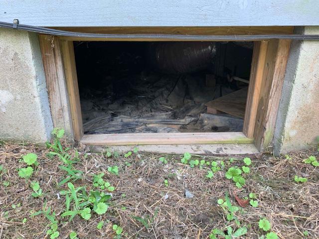 The crawl space access is a huge hole allowing in the air carrying moisture. With the door in place, it is not airtight and offers no resistance to outside temperatures. Low to the ground doors can also allow water to flow into the crawl space when it rains.