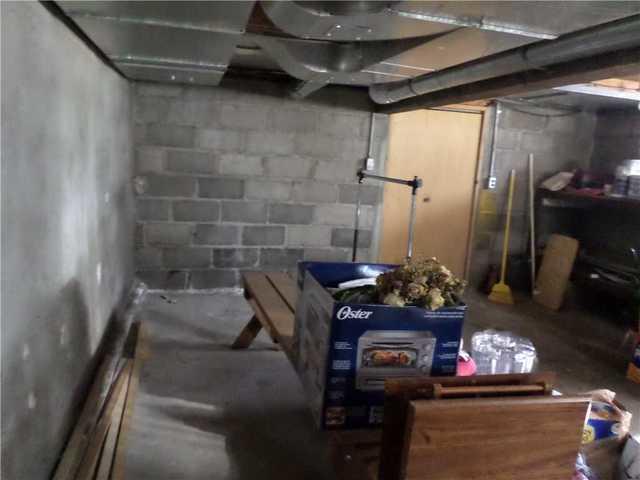 Before Photo - Bowing Walls
