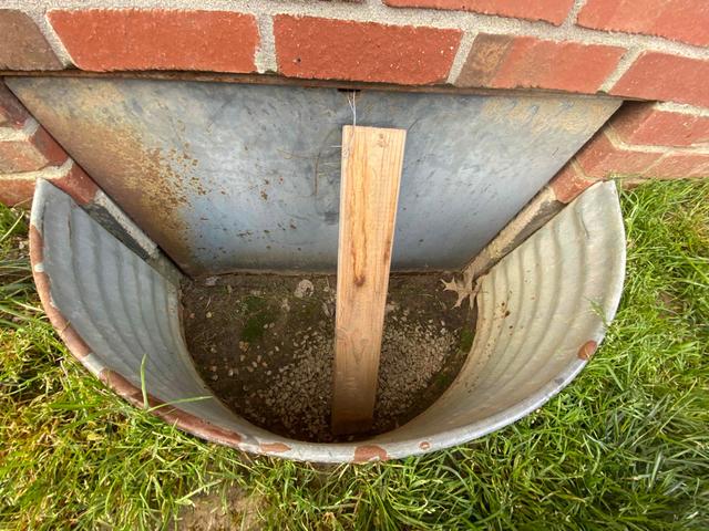 A Makeshift Crawl Space Door