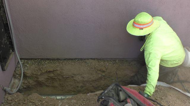Arizona Foundation Solutions Foreperson, Danny Balderas, digging the dry air intake for this Tucson MoistureLevel System.