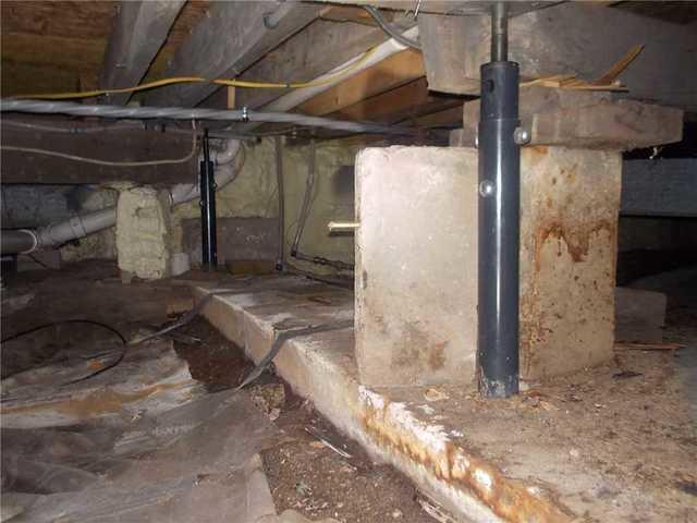 Water Damage in Crawl Space Shows Discoloration