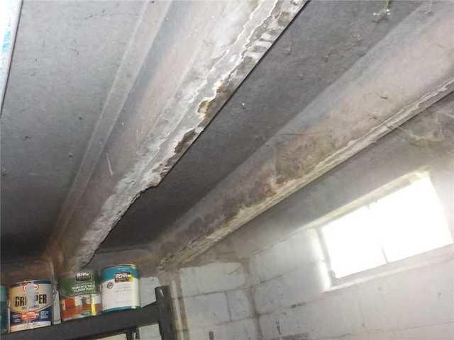 Water Damage Visible on Basement Ceiling