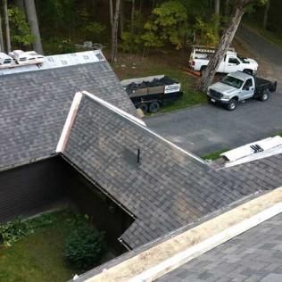 Asphalt shingle roofing  being installed in Pittsfield, MA.