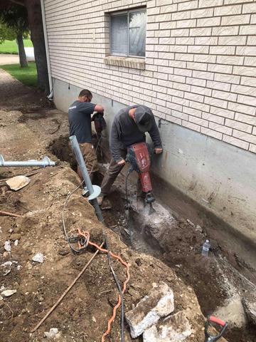 Helical Piers prep. Digging out the holes to install