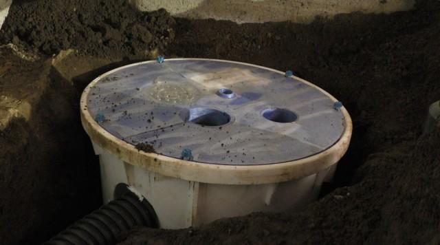 A look at the sump pump installed in the crawl space.