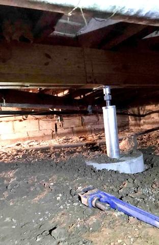 SmartJacks installed to stabilize sagging floors above the crawl space