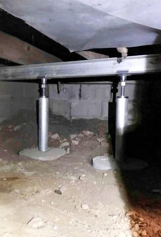 SmartJacks installed to stabilize sagging floors above the crawl space