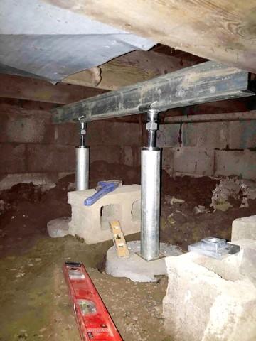 SmartJacks installed to stabilize sagging floors above the crawl space