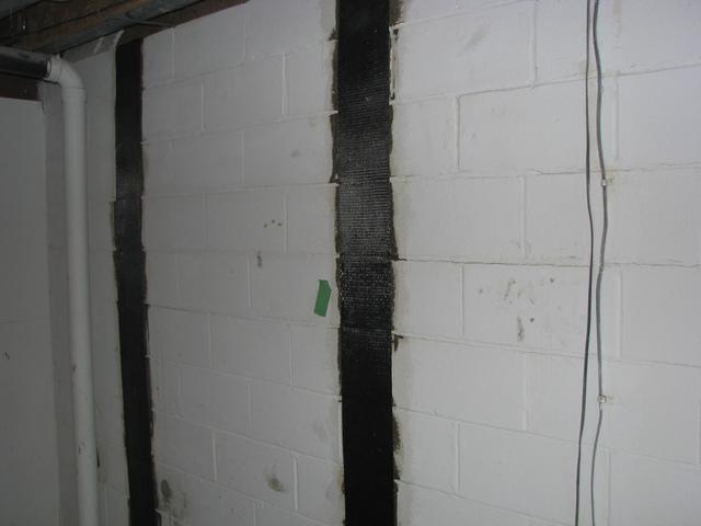 7 inch wide carbon strips are applied to the wall.