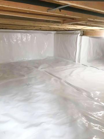 CleanSpace installed to encapsulate the crawl space and prevent moisture from passing through porous walls and floors