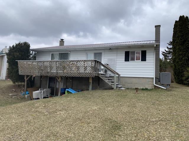 The old deck with rotted wood