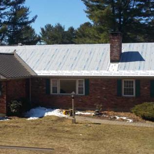 A New Metal Roof Installation in Progress in Richmond, MA