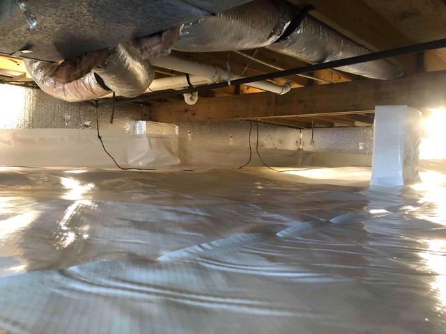 the CleanSpace vapor barrier system not only protects the crawl space against ambient moisture, but it also cleans up the look of the space.