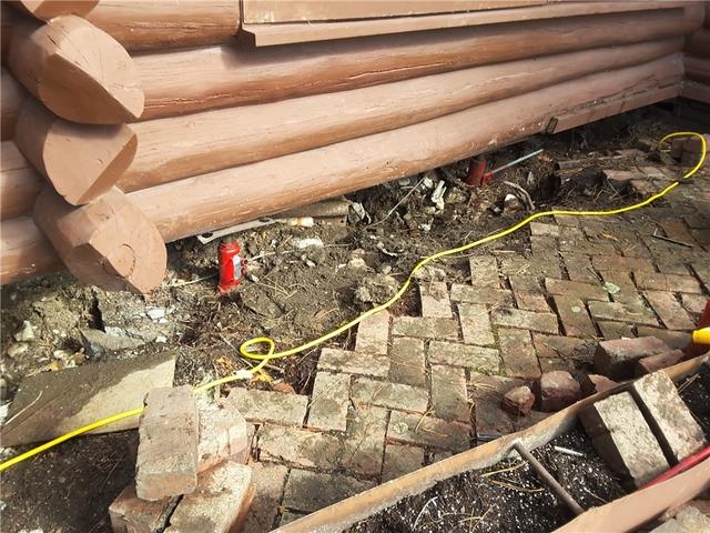 Cabin is Lifted and Ready for Piering