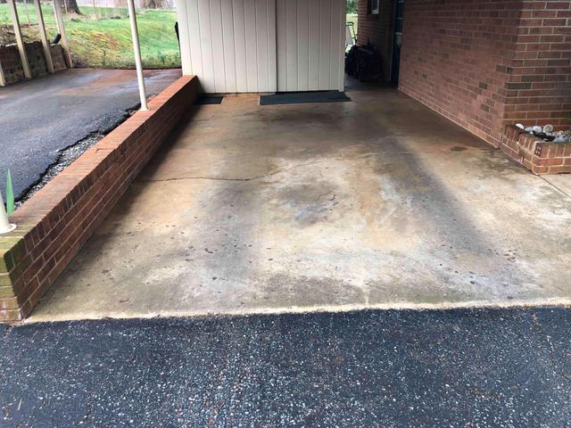 The carport had a large crack running through the center that would only get worse with time.