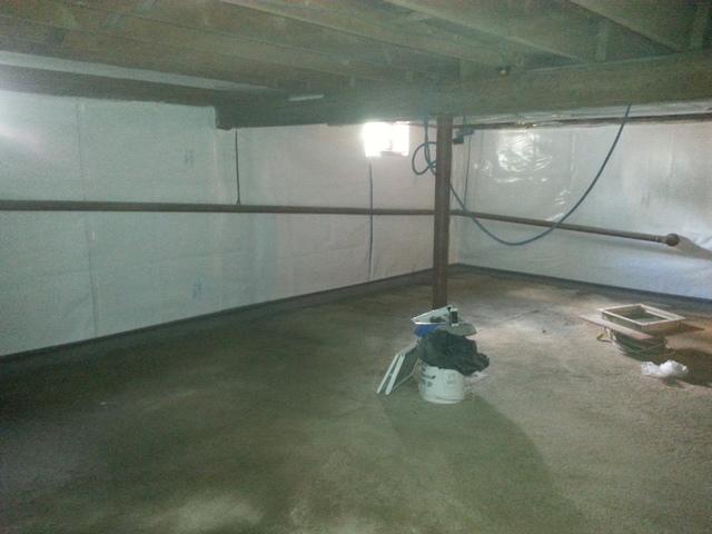 <p>This picture shows the completed basement that is now waterproof and clean. Notice the CleanSpace vapor barrier on the walls that gives the area a clean, fresh look.</p>