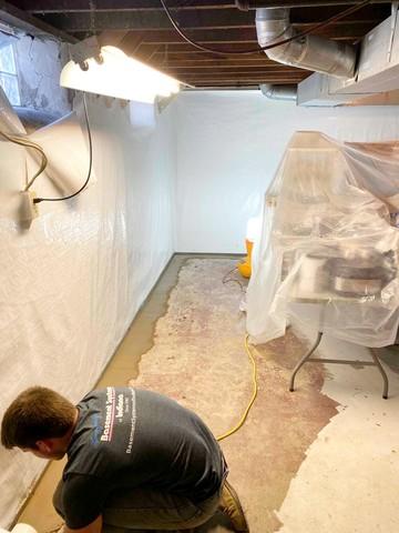 Production Crew Installing Finishing Waterproofing
