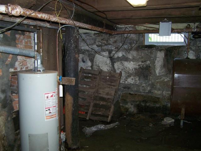 The basement of this Cross River, NY home was very wet. To dry it out, we installed our SuperSump pump system. This powerful cast-iron sump pump can remove up to 2,500 gallons of water per hour from the area. It comes with an airtight lid to keep out debris and protect the sump pump so it will keep the area dry for years to come!