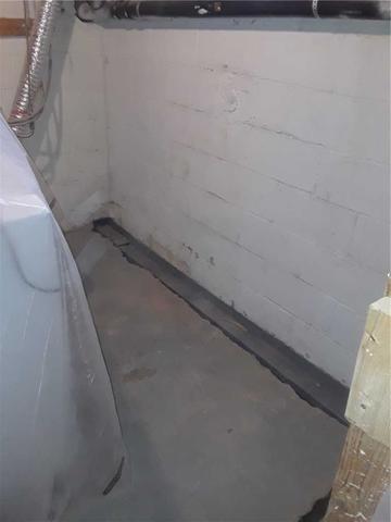 Before Photo - Rough Damp Walls