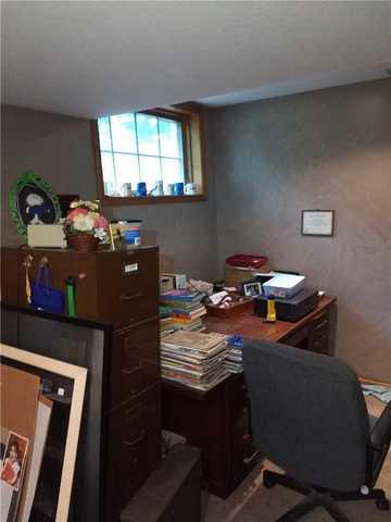 Water leaking into the basement from this window corner had this owner moving his library upstairs.