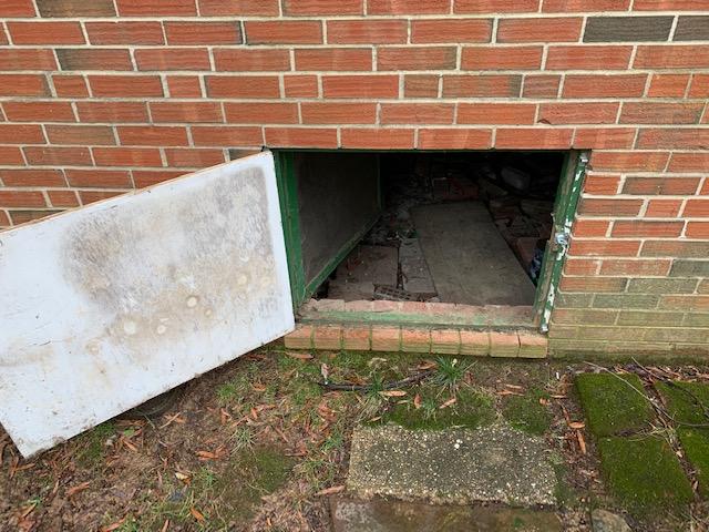 Entrance to the crawl space.