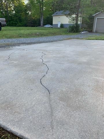 This driveway was cracked and not level.