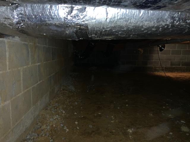 This dirty crawlspace really needed a facelift.