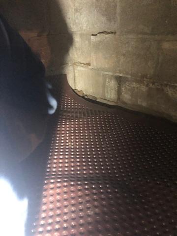 Drainage Matting on Dirt Surface