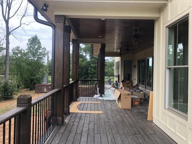 <p>Here we installed Cedar post and a cedar handrail using the Fortress Fe26 Traditional Railing system. Smooth cut cedar porch ceiling.</p>