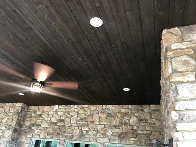 <p>Rough cut cedar porch ceiling with LED can lights.</p>