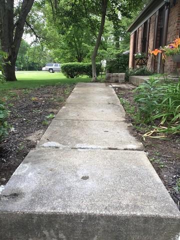 Unlevel Sidewalk slabs.