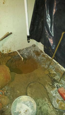 Trench near existing sump pit widened