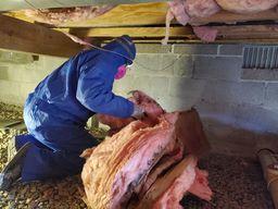 Removing old insulation in tight conditions