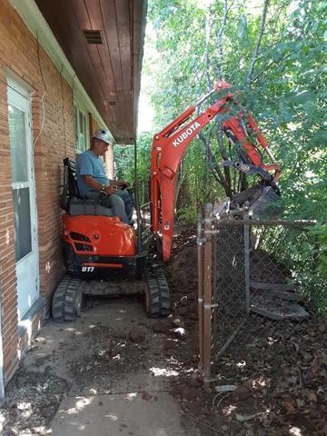 Excavating the areas for the windows to be put in.