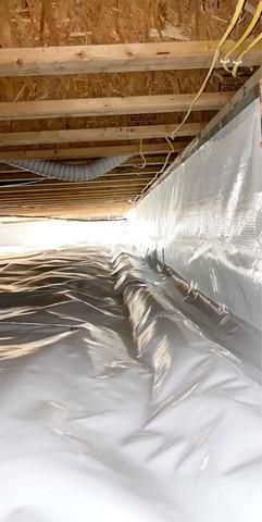 Crawl Space encapsulation with CleanSpace Vapor Barrier that seals the crawl space from the Earth and prevents moisture from passing through