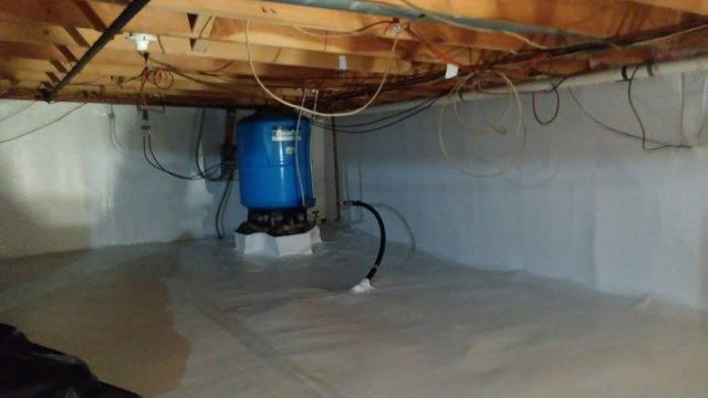 Water leaking from walls caught With Vapor Barrier