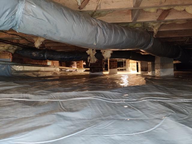 The final product was a crawl space protected from water vapor, water seepage, and increased the overall air quality.