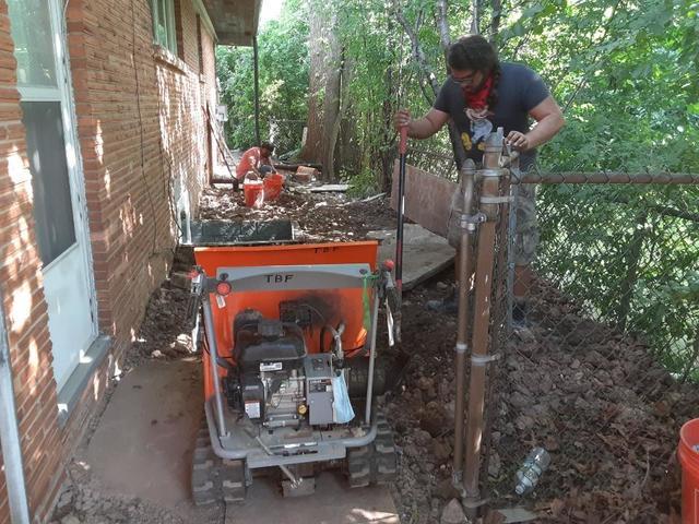 Cleaning up from excavating and egress window install.