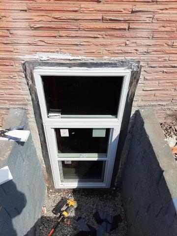 The egress window has been installed and needs the finish put on the outside.